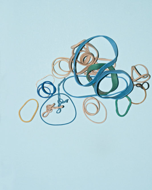 beige, yellow, and blue loom bands