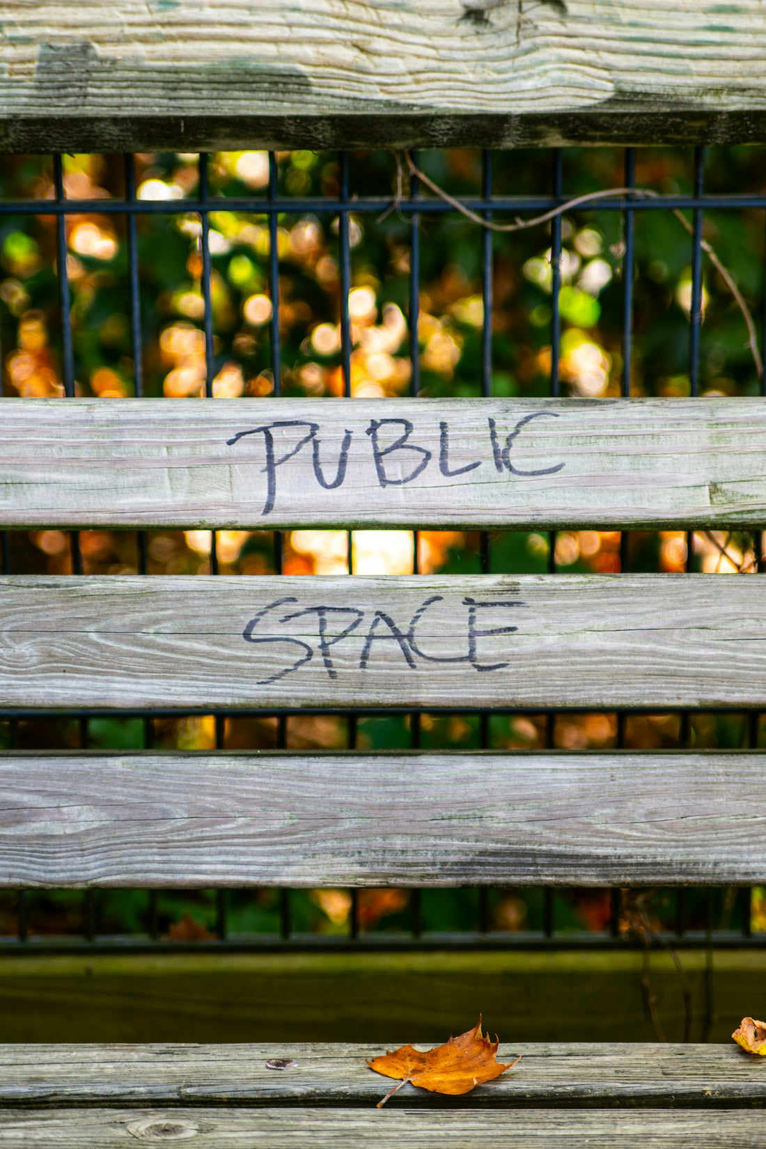 brown wooden frame with public space sign