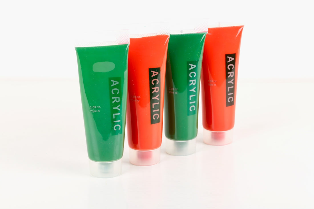 three tubes of acrylic sitting next to each other