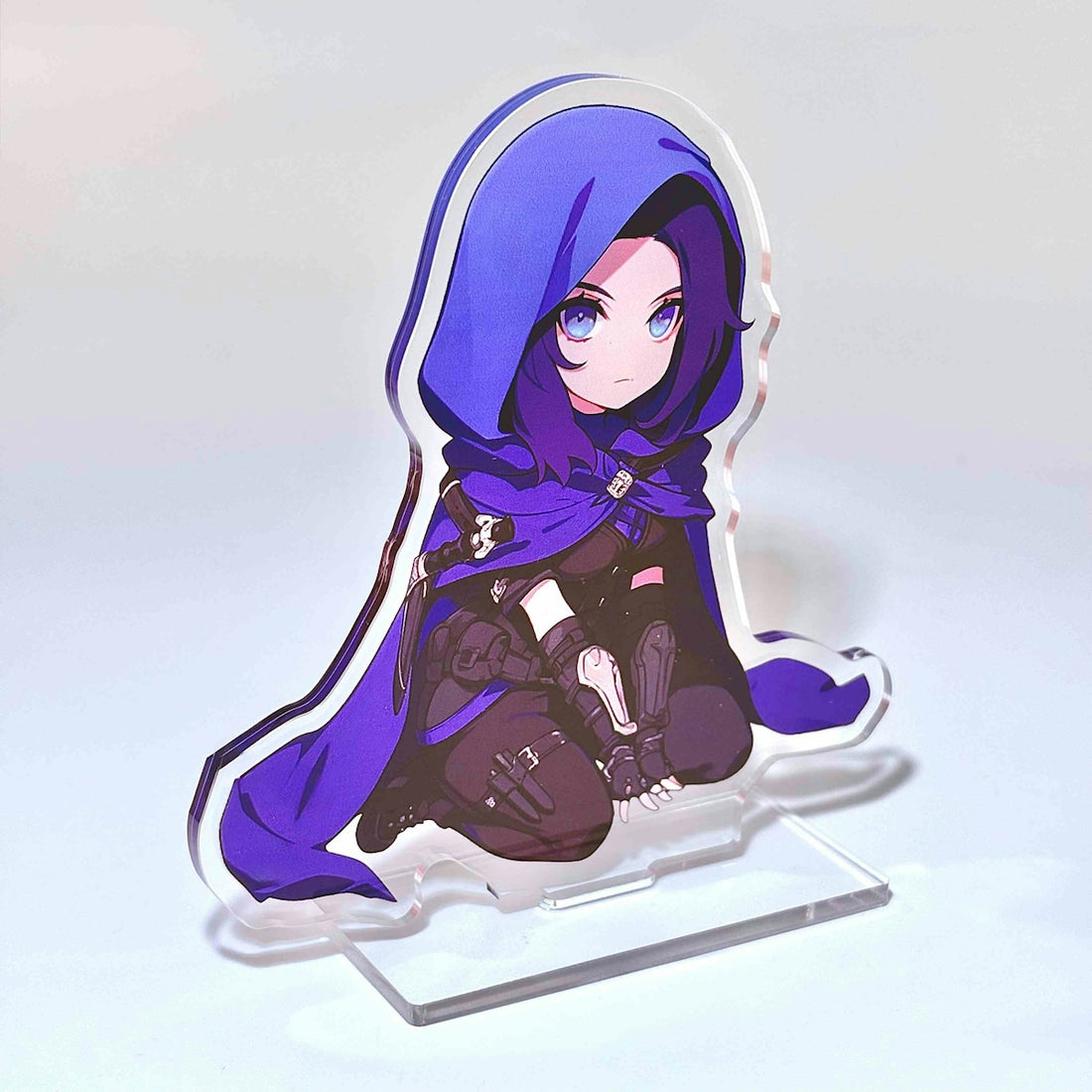 Cute anime figure with a blue hood